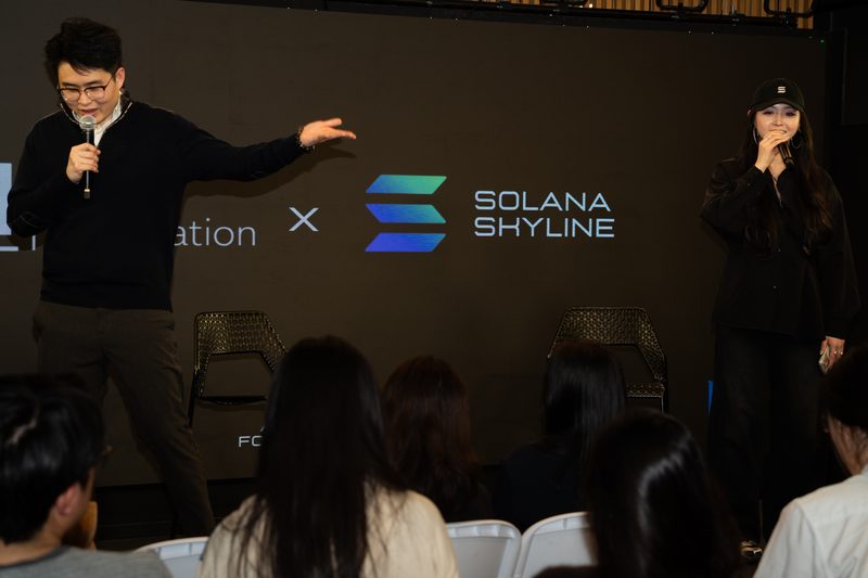 Ryan Zhang and Angie Liu on stage at the February 13, 2026 program